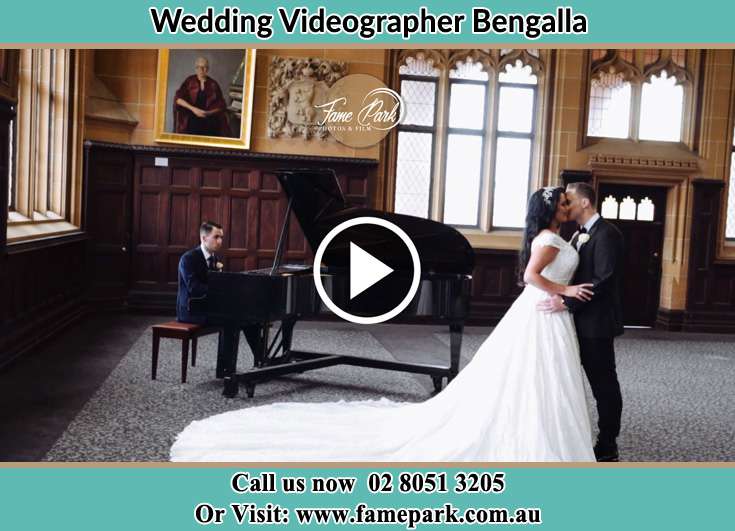 The newlyweds dancing with the pianist playing their song Bengalla NSW 2333