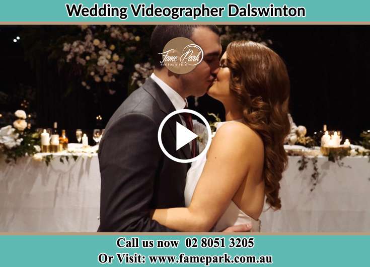 The newlyweds kissing Dalswinton NSW 2328